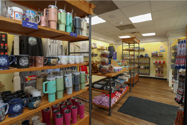 Photo of mugs, cups, candy, and other riverboat souvenirs in the Riverboats Gift Shp